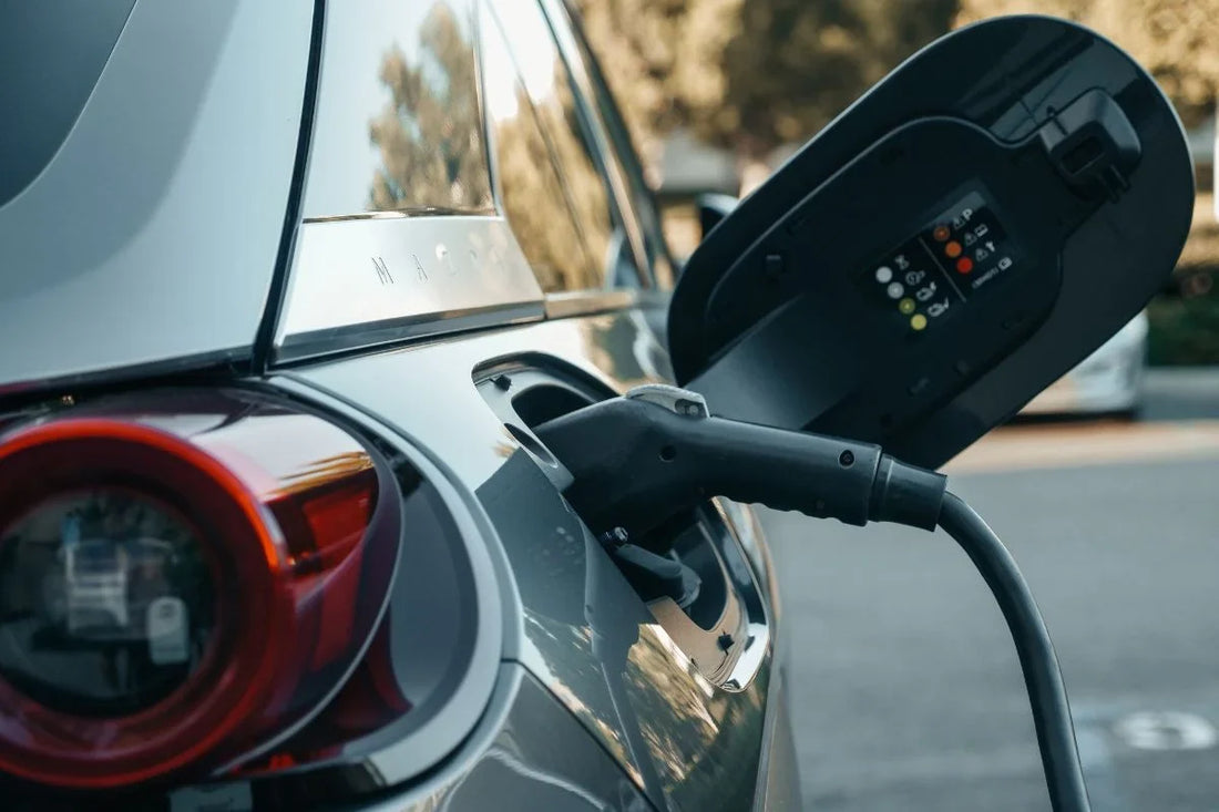 Electric car plugged into an EV charger
