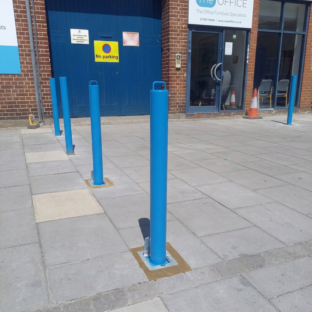 Close up of blue removable bollards