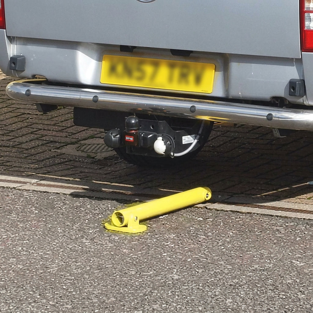 Fold-Down Disabled Parking Space Protector