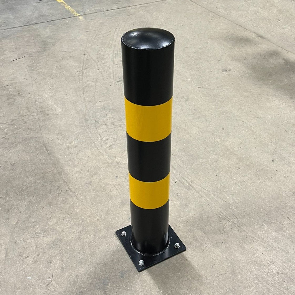 Close up of bolt down bollard from above