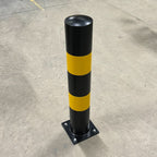 Close up of bolt down bollard from above